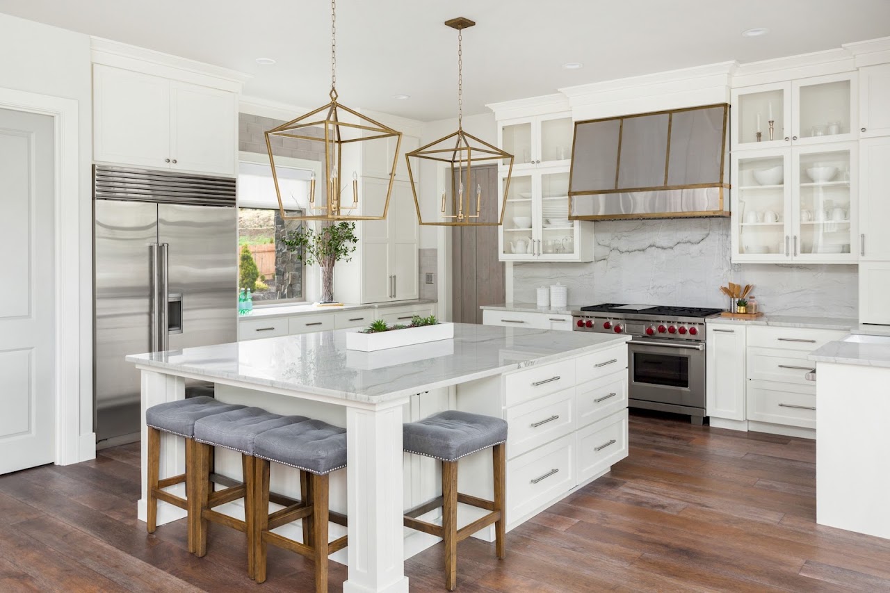 Spotless luxury Orlando home interior with open kitchen and pool view